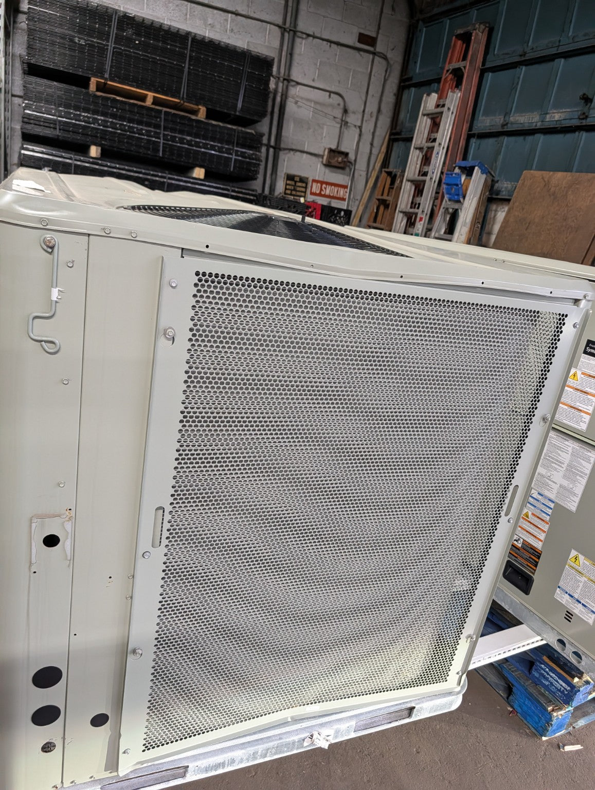 Trane 6 ton rooftop packaged HVAC unit side condenser grille scratch and dent